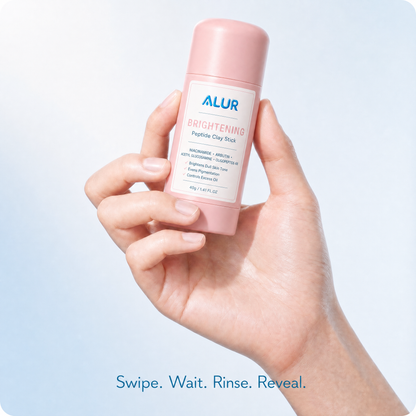 ALUR Brightening Peptide Clay Stick - Hand Lifestyle
